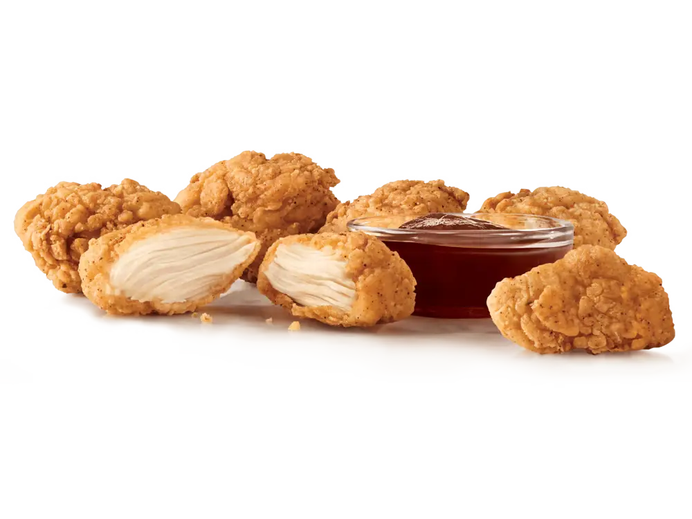 Premium 6PC Chicken Nuggets, crispy and tender, perfect for a quick bite.